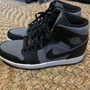 OG Jordan 1s in black and grey